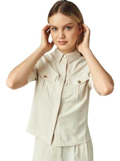 BLUSA LISA MANGA CORTA MARFIL HOLLY LAND