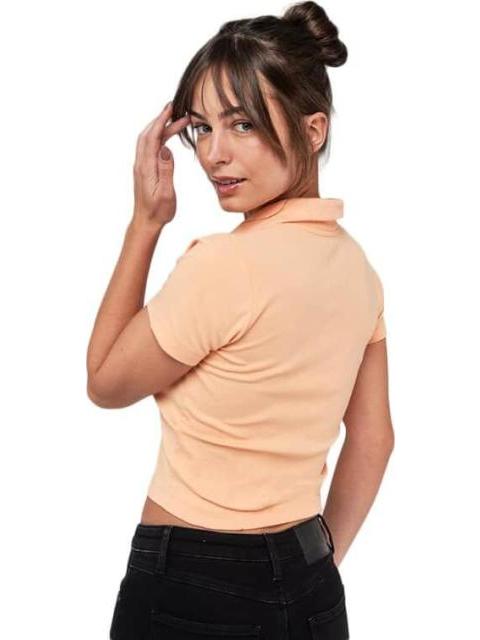 PLAYERA CROP CORAL HOLLY LAND